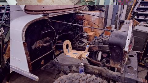 MCA motor cradle assembly plywood pattern and new front battery box mockup in the CJ-5 engine bay