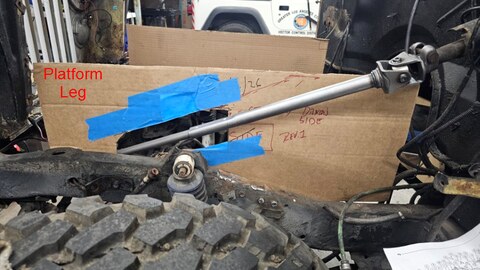 Intermediate steering shaft mocked up alongside the CJ-5 driver's side platform leg cardboard template